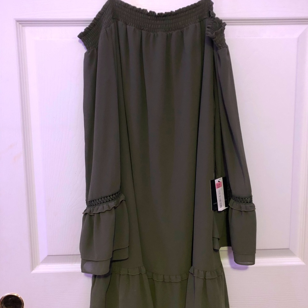 Green dress with off shoulder long sleeves with straps